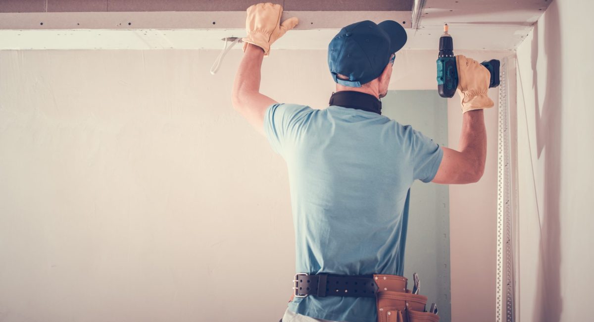 Caucasian Contractor and the Apartment Remodeling Work.